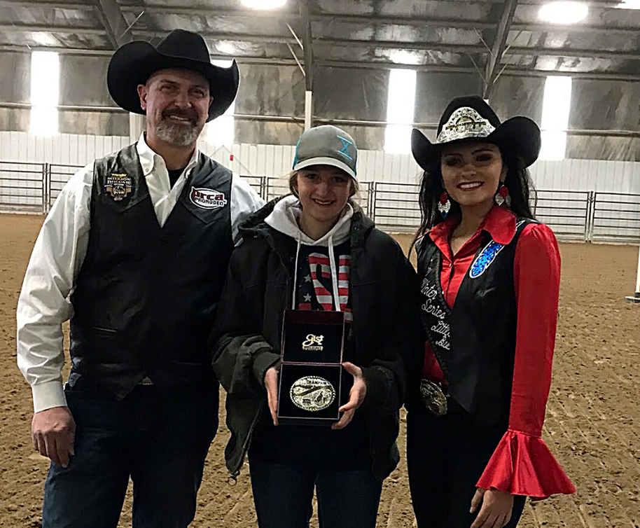Marj with her 1st place rodeo buckle